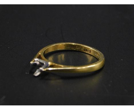 An 18ct gold ring, lacking stone, 2.2g. 