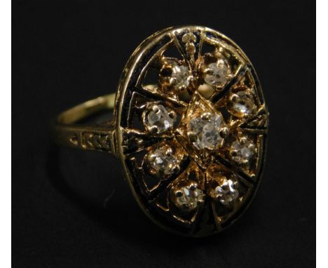 A cluster dress ring, set in an oval shape with tiny diamonds, and enamel decoration, yellow metal, marked 14K, 2.8g all in. 