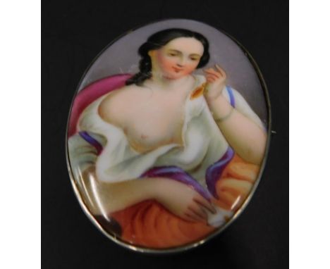 A porcelain brooch, the portrait plaque of a lady in dress, in a silver plated frame, 6.5cm x 4.5cm. 