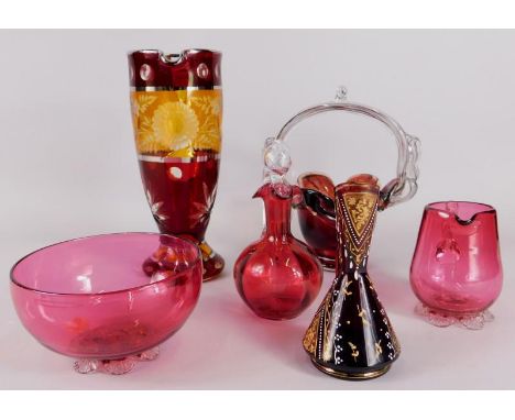 A collection of glass, to include a cranberry tinted bowl, a small bottle and stopper, jug, ruby tinted and amber flash jug e