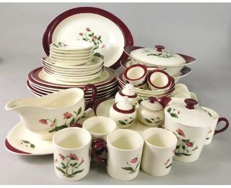 A Wedgwood Mayfield pattern part dinner and tea service, decorated with flowers, poppies in red and green