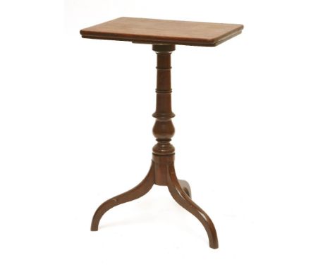 A George III mahogany tripod reading stand,the hinged top with a ratchet mechanism, hinges detached,48cm wide74cm high