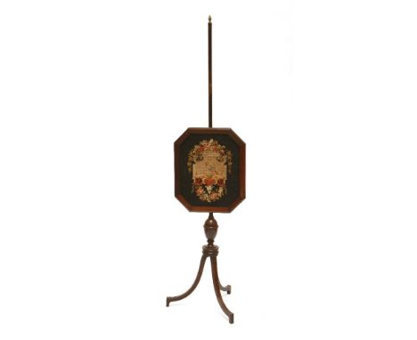 A Regency mahogany pole screen, with a rosewood-framed tapestry panel, on a tripod base,151cm high