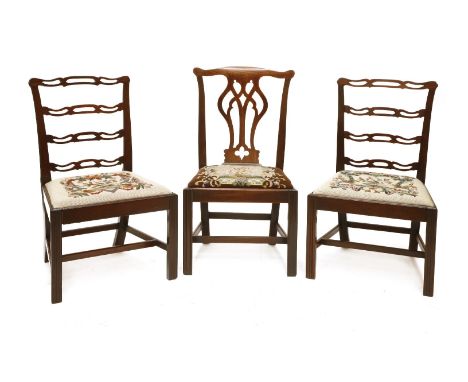 A pair of Chippendale period single chairs,with pierced ladder backs, needlepoint drop-in seats and moulded square front legs