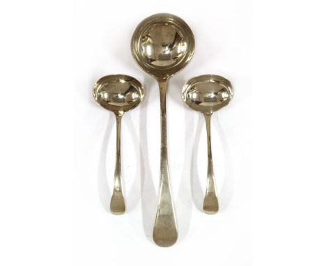 A silver old English pattern soup ladle,by Walker &amp; Hall, Sheffield 1917, together with two old English pattern sauce lad
