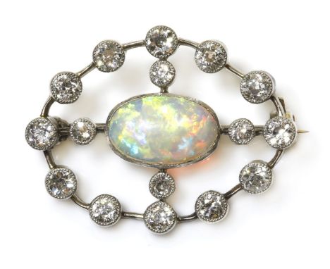 A Belle Époque opal and diamond brooch, c.1905-1915,with a single oval cut cabochon opal, rub set in a white collet to an ope