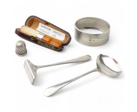 baby's silver spoon and pusher Sheffield 1936, silver oval serviette ring, Edwardian silver and amber cheroot holder in leath