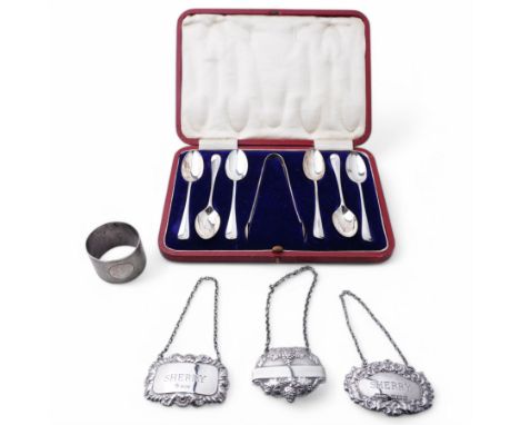 Set of six silver teaspoons and tongs, cased, Sheffield 1911 Maker James Dixon & Sons, three various silver decanter labels a