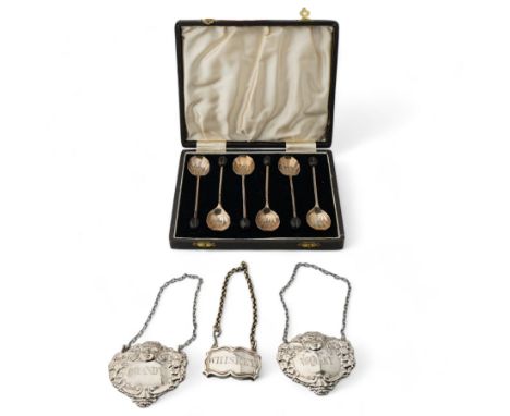 Pair of silver decanter labels 'Whisky' and 'Brandy', Birmingham 1993, another 'Whiskey' and a set of six silver bead knop co
