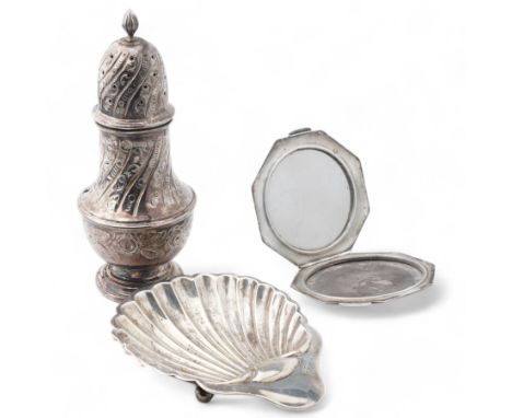 Silver sugar caster with embossed decoration Sheffield 1992, silver shell butter dish and an engine turned silver compact (3)