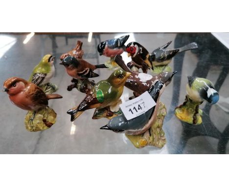 ELEVEN ASSORTED BESWICK CERAMIC BIRD FIGURES 