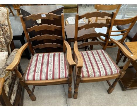TWO OAK LADDER BACK CARVER DINING CHAIRS 