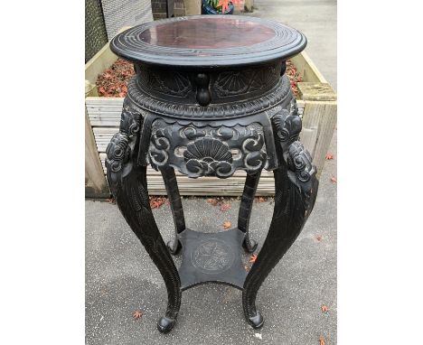 A 19TH CENTURY CHINESE ROSEWOOD TOP JARDINIERE STAND WITH CARVED DESIGN AND LOWER SHELF 