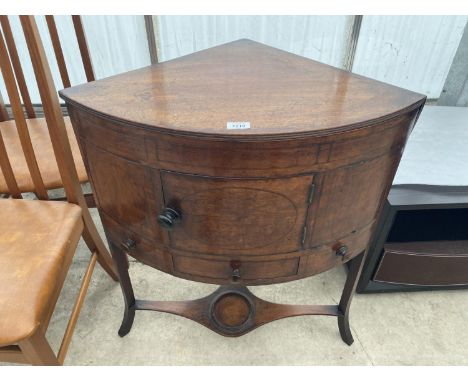 A SMALL VICTORIAN BOW FRONT CORNER CUPBOARD/WASH STAND WITH ONE DOOR, THREE DRAWERS AND LOWER SHELF 