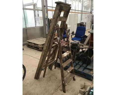 TWO PAIRS OF VINTAGE WOODEN STEP LADDERS TO INCLUDE A FOUR STEP AND A SEVEN STEP 