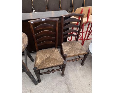 TWO LADDER BACK OAK DINING CHAIRS WITH RUSH SEATS 