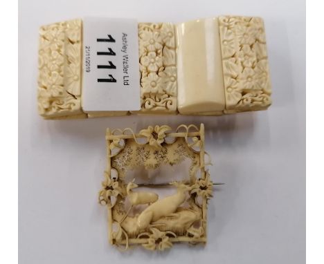TWO BONE ITEMS - CARVED BROOCH AND SECTIONAL BANGLE 