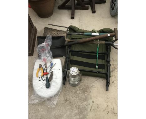 A FOLDING FISHING CHAIR, A LANTERN, TWO SHOVELS, A FORK AND TOOLS ETC 