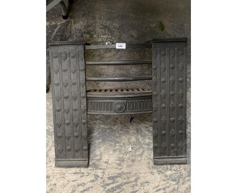 A HEAVY CAST METAL FIRE GRATE COVER 