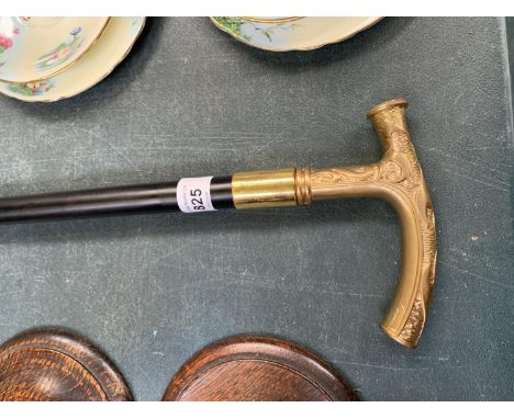 A BRASS HANDLED WALKING STICK 