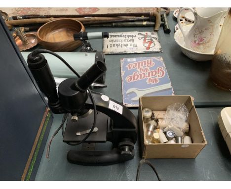 A STUDENTS MICROSCOPE AND ACCESSORIES 