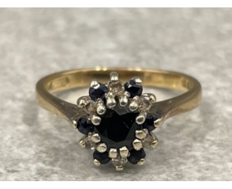 9ct gold oval sapphire diamond ring. 2.2g size K