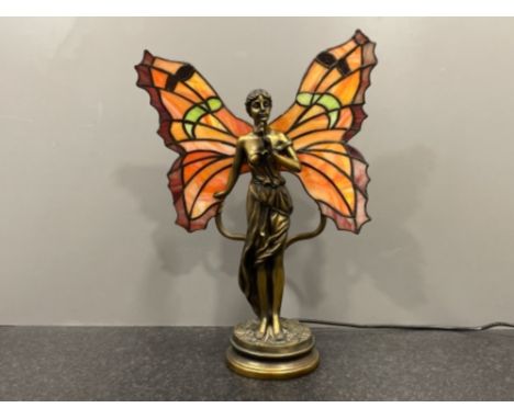 Tiffany style lamp depicting butterfly woman with flowers