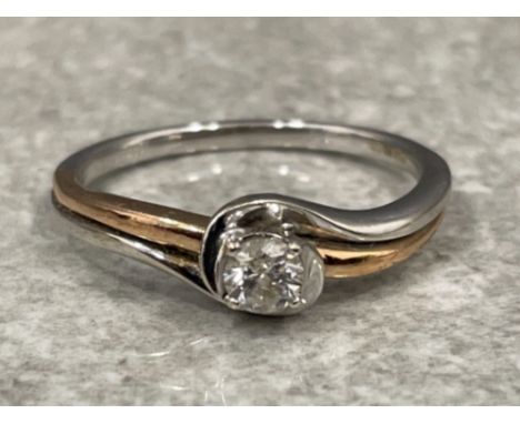 9ct white gold and Rose gold Diamond solitaire ring. Approx .20ct size M 2.4g