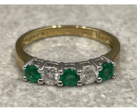 Ladies 18ct gold Emerald and Diamond ring. Size K 1.65g