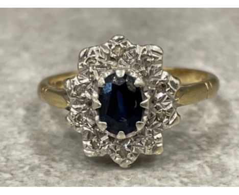 9ct gold oval Sapphire and diamond cluster ring. Size R 3.3G