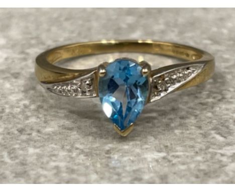 9ct gold pear shaped Blue Topaz and diamond ring. 1.9g size M1/2