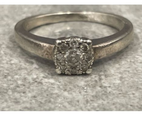 White gold Diamond cluster ring. Approx .25cts size M 3.2g