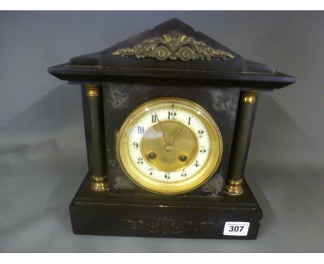 A French black slate mantle clock the dial signed Lashmore Paris