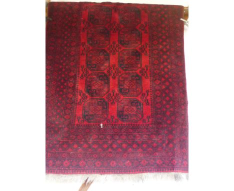 A modern hand knotted woollen Afghan Nahzat elephants foot design rug - 2.24 m x 1.55 m