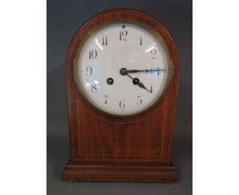 A mahogany cased mantel clock, Arabic numerals to white dial,  line inlaid case