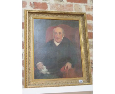 A 19th century oil on canvas - portrait of a Gentleman seated in a wing armchair, inscribed in ink to stretcher - A gift from