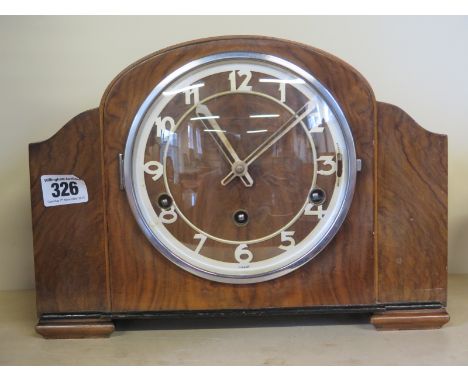 A walnut case eight day movement mantel clock, with Westminster chimes, 
Condition report:  Working with key