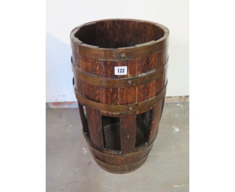 An oak coopered barrel stick stand by R A Lister - Height 60cm x Diameter 32cm