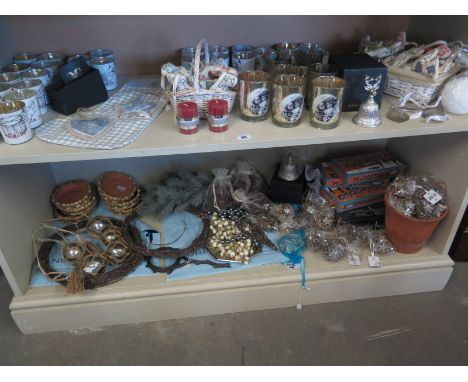 Festive items including 34 Christmas theme tea light holders, silver bauble - in total two shelves