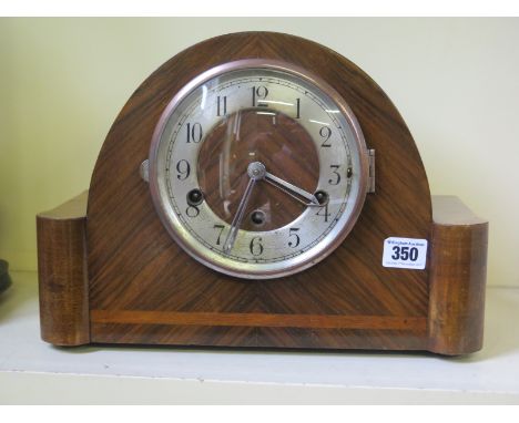 A 1930's walnut cased mahogany eight day mantle clock, Westminster chimes 
Condition report:  Working with key 