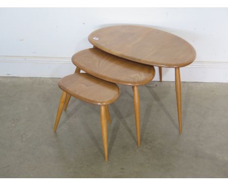 A 1950/60's Ercol Pebble nest of three tables 