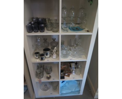 A quantity of glassware including tea light holders, delicate dome covered tazza's - four in total - and other interesting gl