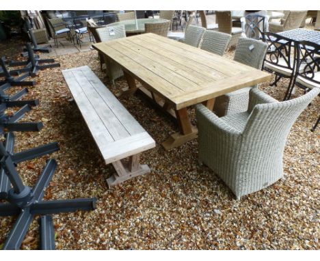 A Bramblecrest teak Kuta 240cm table and bench with two armchairs and three sidechairs - no cushions