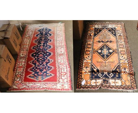 North West Persian Runner, the faded strawberry field with crenelated indigo panel enclosed by borders of stylised turtle mot