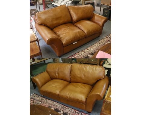 A Pair of Leather Sofas (one of which is a sofa bed)Condition is generally very good. Some minor scuffs to the leather around