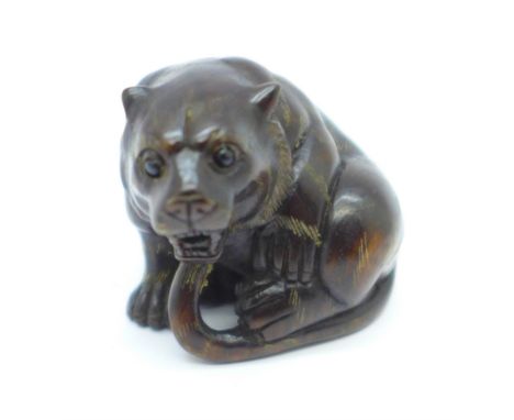 A signed tiger netsuke 