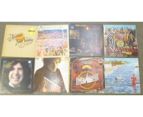 Eight LP records, The Beatles Sgt. Peppers, Sandy Denny, Bob Dylan, Genesis, Neil Young, etc. 