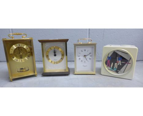 A Bush retrol alarm clock radio and three quartz carriage clocks **PLEASE NOTE THIS LOT IS NOT ELIGIBLE FOR POSTING AND PACKI
