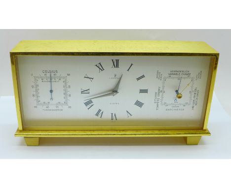 A Looping Electric desk clock, thermometer and barometer combination, with a box marked Boodle &amp; Dunthorne, 20cm wide 