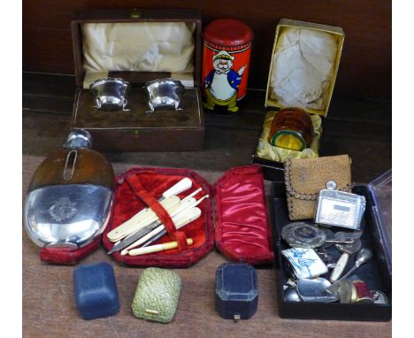 A plated and leather covered hip flask, plated salts, tin plate post box, etc. 